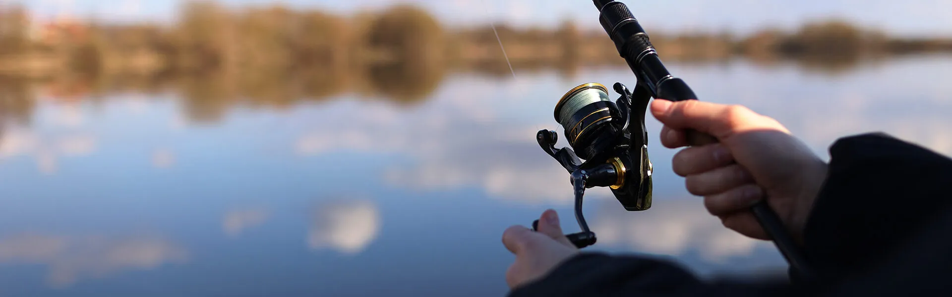 banner-fisherman-with-rod banner-fisherman-with-rod